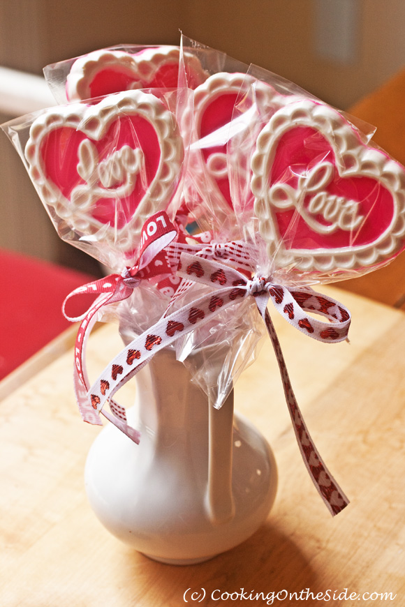 Valentine's Day Chocolate Lollipops -- use this easy technique with any candy mold for a special sweet treat